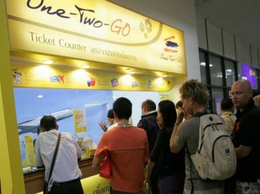 Passengers at the One-Two-Go counter at Phuket airport on September 16