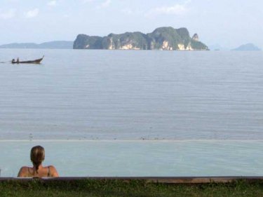 Things may appear calm on the surface, but the Phuket economy is in for some stormy times