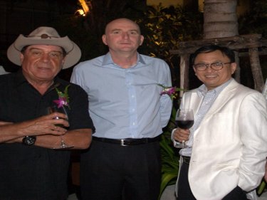 Australian Ambassador Paul Grigson (centre) with celebrity Molly Meldrum and OrBorJor president Paiboon Upatising