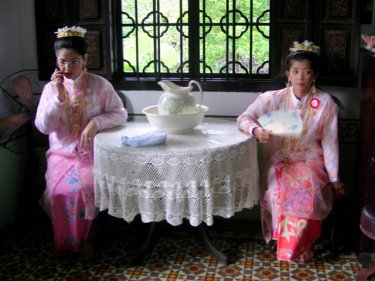 A pair of Baba brides await the big moment on Phuket, 2005