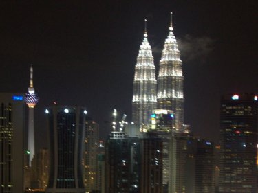 The twin towers shine on, unlike Kuala Lumpur's taxi drivers. But the lights went out for Earth Hour at the weekend