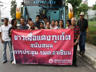 Phuket Red supporters catch a bus off the island on Saturday