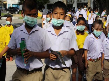 Children mask up at a Phuket school today