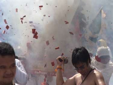 A VIP bodyguard's nightmare: exploding crackers and wild people on parade