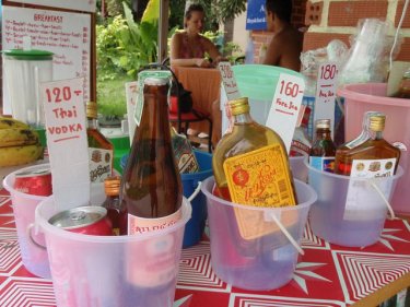 Buckets of different sizes that tourists mix and drink on Phi Phi