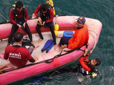 Divers off Phuket carry poached coral blooms back to the ocean