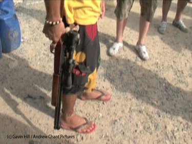 The gun appears in the Phuket jet-ski standoff with British marines