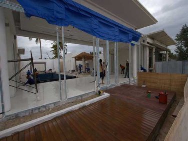 A West Sands villa goes up on the 500-metre stretch of Phuket's Mai Khao beach