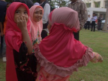 At Phuket Airport, Muslim children enjoy the fun of the farewell