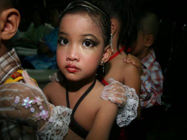 Young lady all dressed up for the Loy Kratong festival in Karon