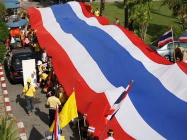 Phuket protesters show the flag as politics reaches the streets once again