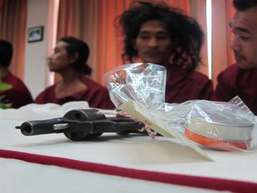 One weapon and some of the accused produced in a Phuket media show