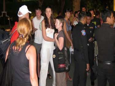Russians tourists mill about in their protest on Phuket last night