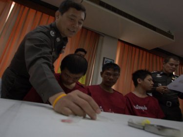 Phuket Police Chief Major General Pekad with drug-taking paraphernalia