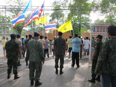 Soldiers greet protesters at Provincial Hall on Phuket today