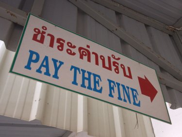 The sign at Kathu station in Patong brings a better deal for expats