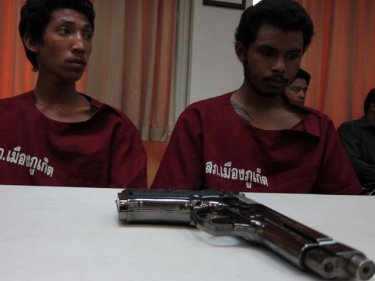 The gun is fake but the two young men are real criminals, say Phuket police