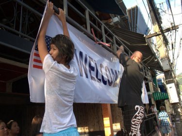 Patong puts out more flags as US vessels keep choosing Phuket