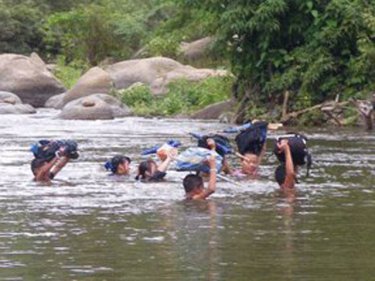 Phuket helps the children who cross a river to and from school each day