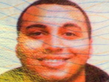 Detail from DaShawn Longfellow's passport  . . . murder trial to come