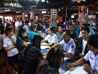 Phuket police check staff at a popular Patong nightspot