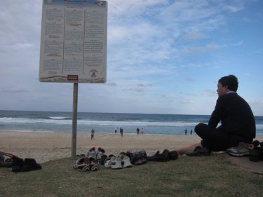 Australia's Gold Coast beach yesterday, with rules on display. A Phuket road show team is in Australia, accompanied by a Phuketwan reporter