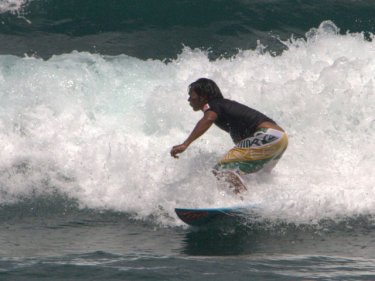 A Phuket surfer on a wave at last year's triple-series event