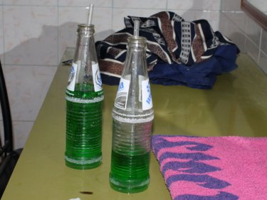 Two green bottles . . . enough to raise the suspicions of Phuket police