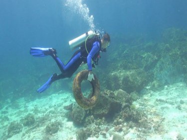 Taking out the trash: a diver with some of the group's haul off Phuket 