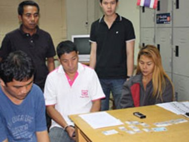 Somkorn Somboon (centre) and other accused at Kathu Police Station