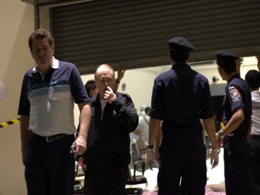 Honorary consuls leave a temporary post-crash morgue at Phuket airport