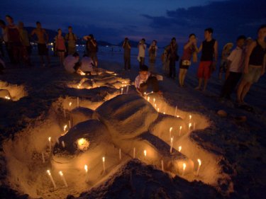 Tonight's ceremony on Patong beach, with candles to remember the dead