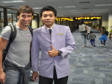 Raul with a fan at Phuket International Airport, heading home after a holiday
