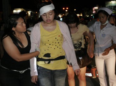 China tourist family members being helped after the Phuket crash