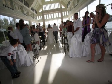 A wedding in the beautiful Laguna Phuket chapel: tragedy won't stop ceremony