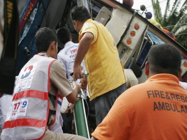On the verge: scene of the Phuket tour bus overturn on Patong Hill today