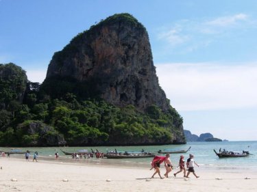 A typical karst formation at a popular Krabi beach: villages sit beneath some