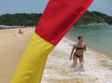 Red and yellow flags mark safe to swim zones on Phuket's beaches