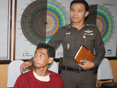 Captain comforts crook: thief Authai Sundorkmai with a victim