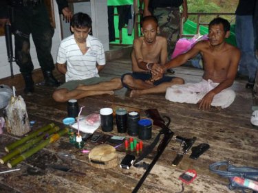 Three men held when armed police raided a house in central Phuket