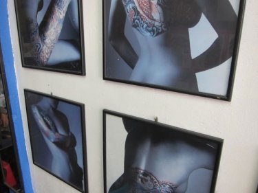 Sample tattoos in a Phuket tattoo salon: limits on artists' freedom