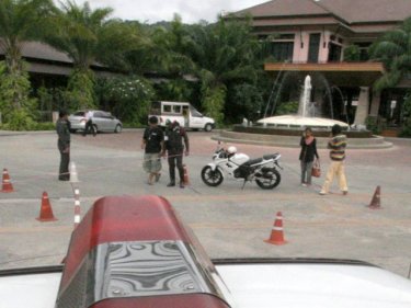 At the Phuket resort entrance where the first shootout took place