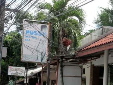 The Pussy Station Bar sign in Karon, not considered family-friendly