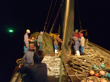 Crew at work on one of the arrested trawlers