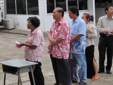 A queue forms ready to vote at the Phuket City council headquarters today