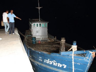 The modified fuel ship Pramiga, arrested and towed back to Phuket