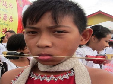 Perhaps Phuket's youngest impaled and entranced warrior, at the age of 10