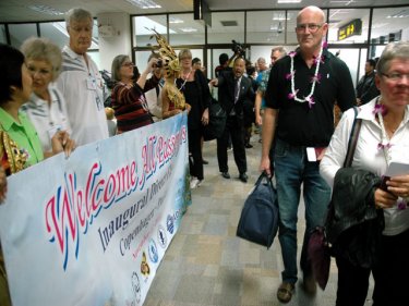 Pioneer passengers disembark to smiles and a big welcome at Phuket