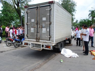 The young student's body on the road after a Phuket crash