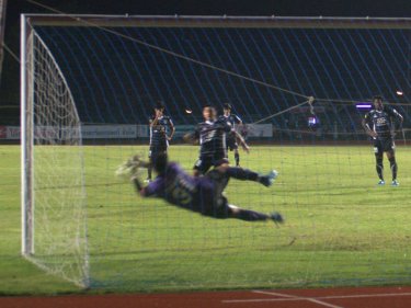 Chantaburi's goalie saves a penalty that would have leveled scores